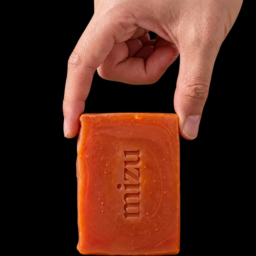 A single orange Mizu soap bar